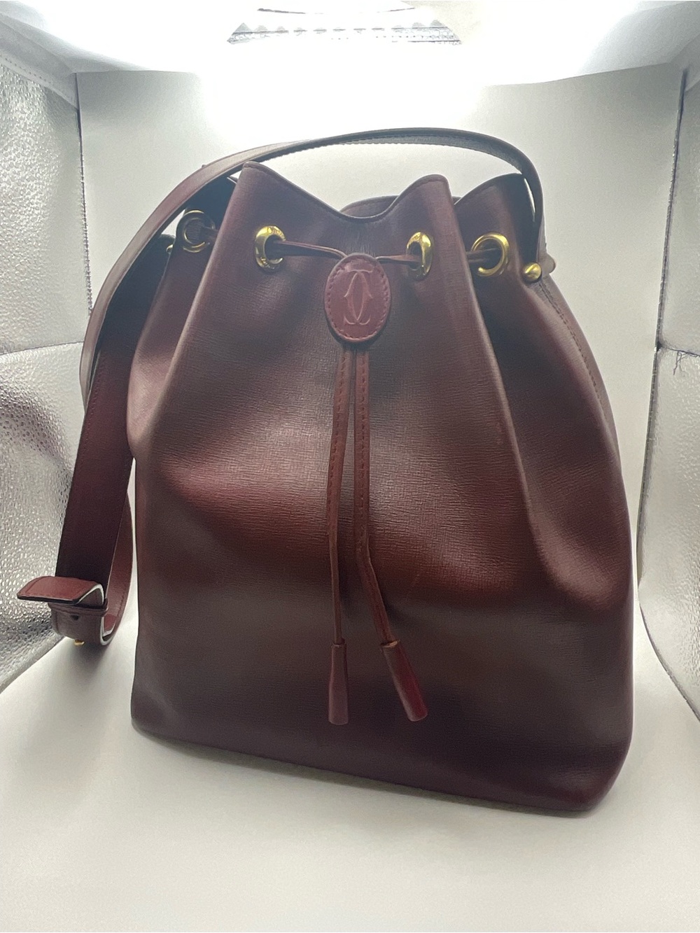 Cartier Must de Cartier Bordeaux Leather Drawstring Bucket Bag with COA